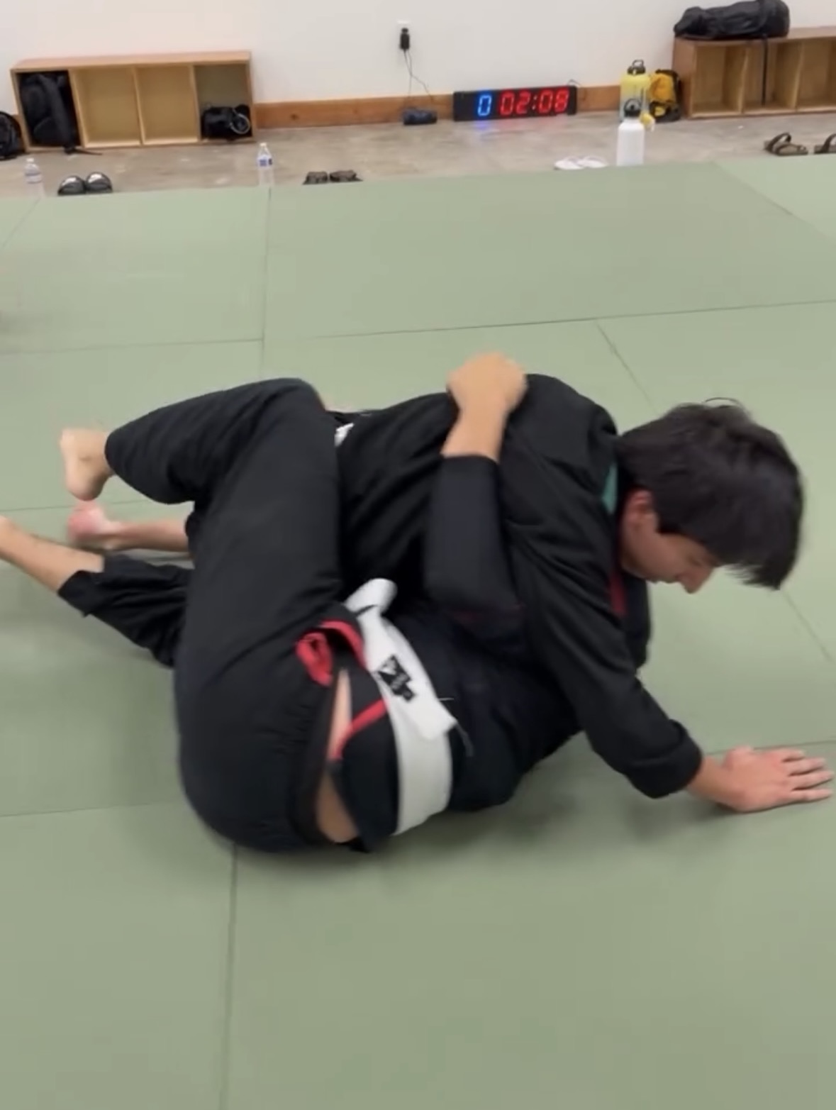 Adult beginners drilling Brazilian Jiu-Jitsu Gi fundamentals at Makoto Jiu Jitsu Academy in Turlock, California