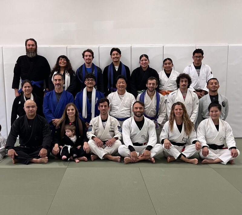 Academy group photo with students in Gi