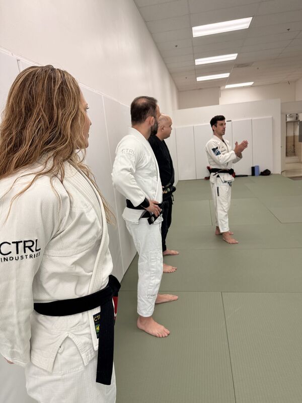 Students lined up on the mats during a belt ceremony