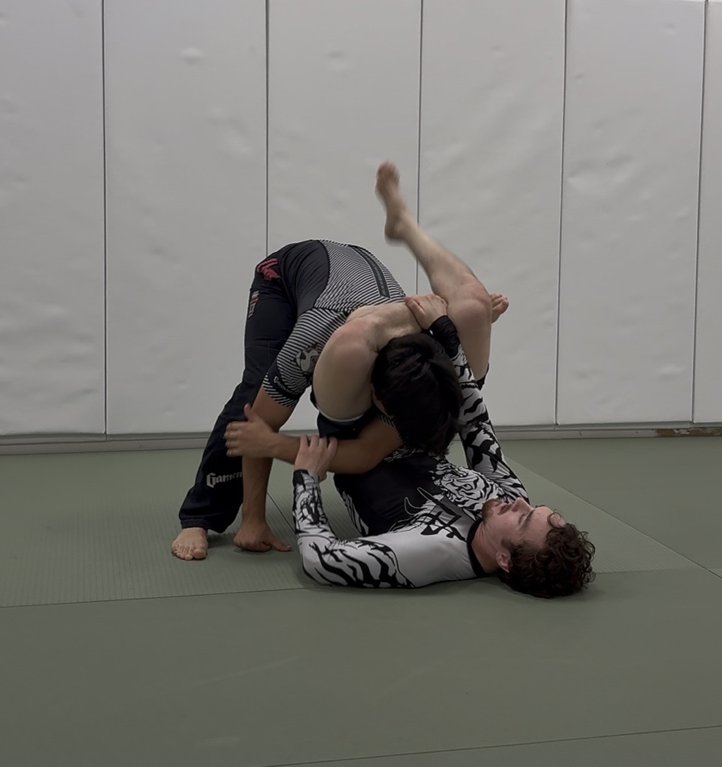 Adults training No-Gi submission grappling in rashguards at Makoto Jiu Jitsu Academy in Turlock